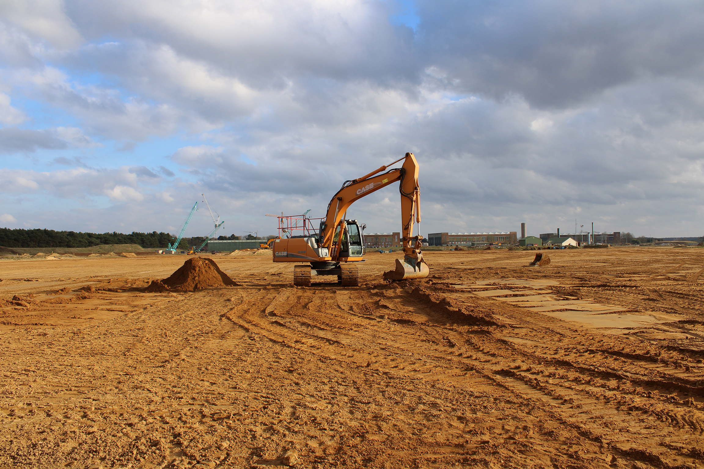 Aidan backfilling a trench and chamber box.jpg